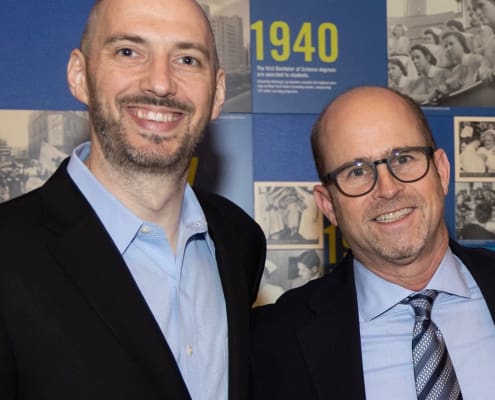CPARF Executive Director Michael Pearlmutter and CP Research Network CEO Paul Gross pose in navy blazers with light blue shirts smiling broadly.
