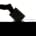 A black and white image of a hand slipping a vote into a ballot box.